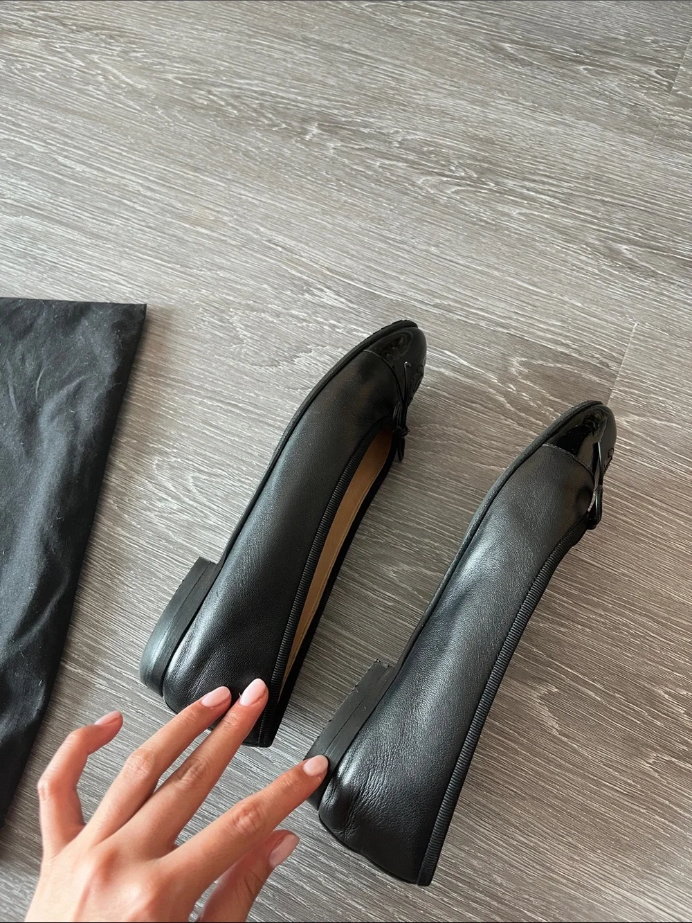 CHANEL Black Leather Cap-Toe Ballet Flats with CC Emblem